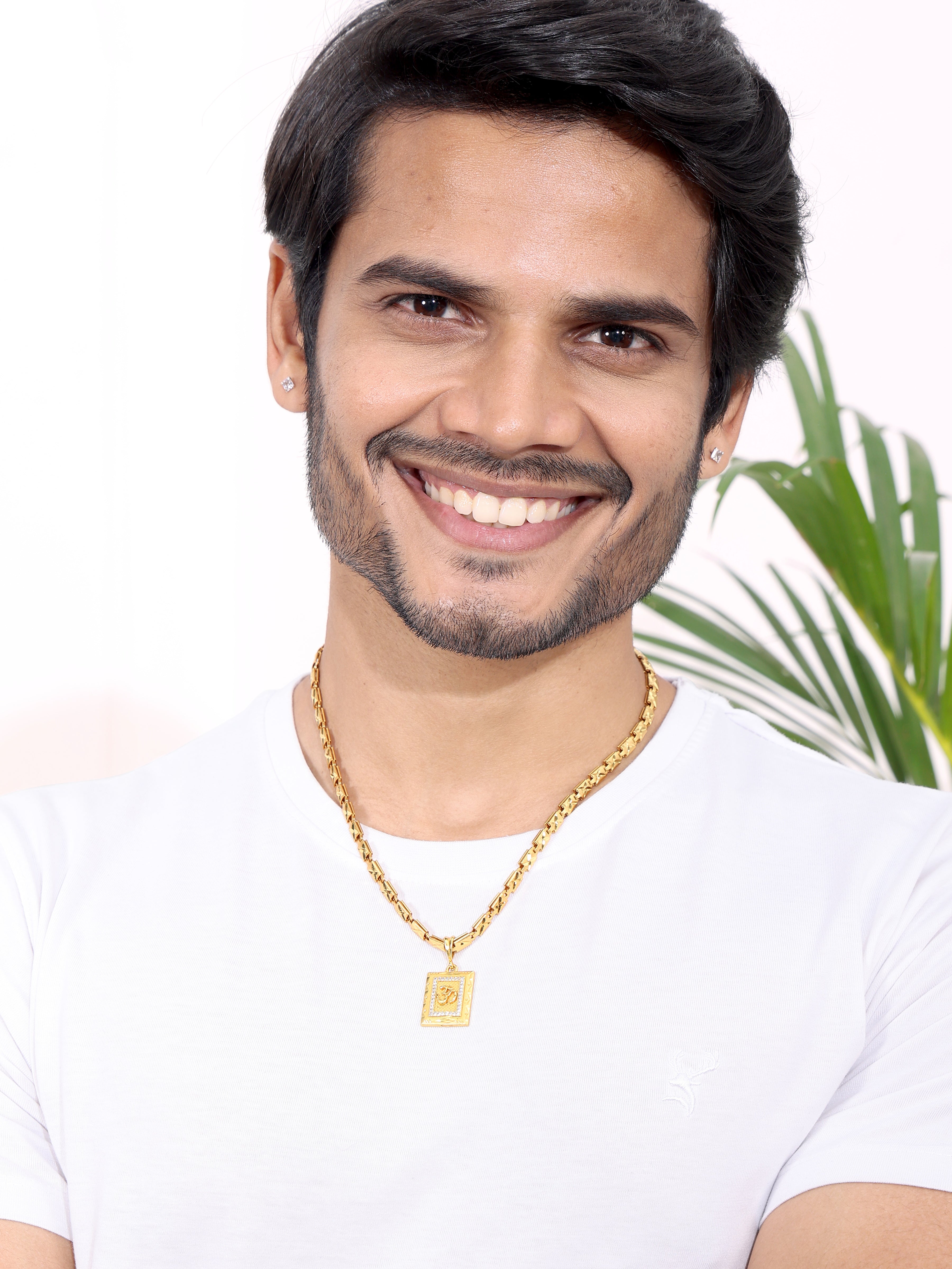 Om Pendant With a Statement Gold Chain