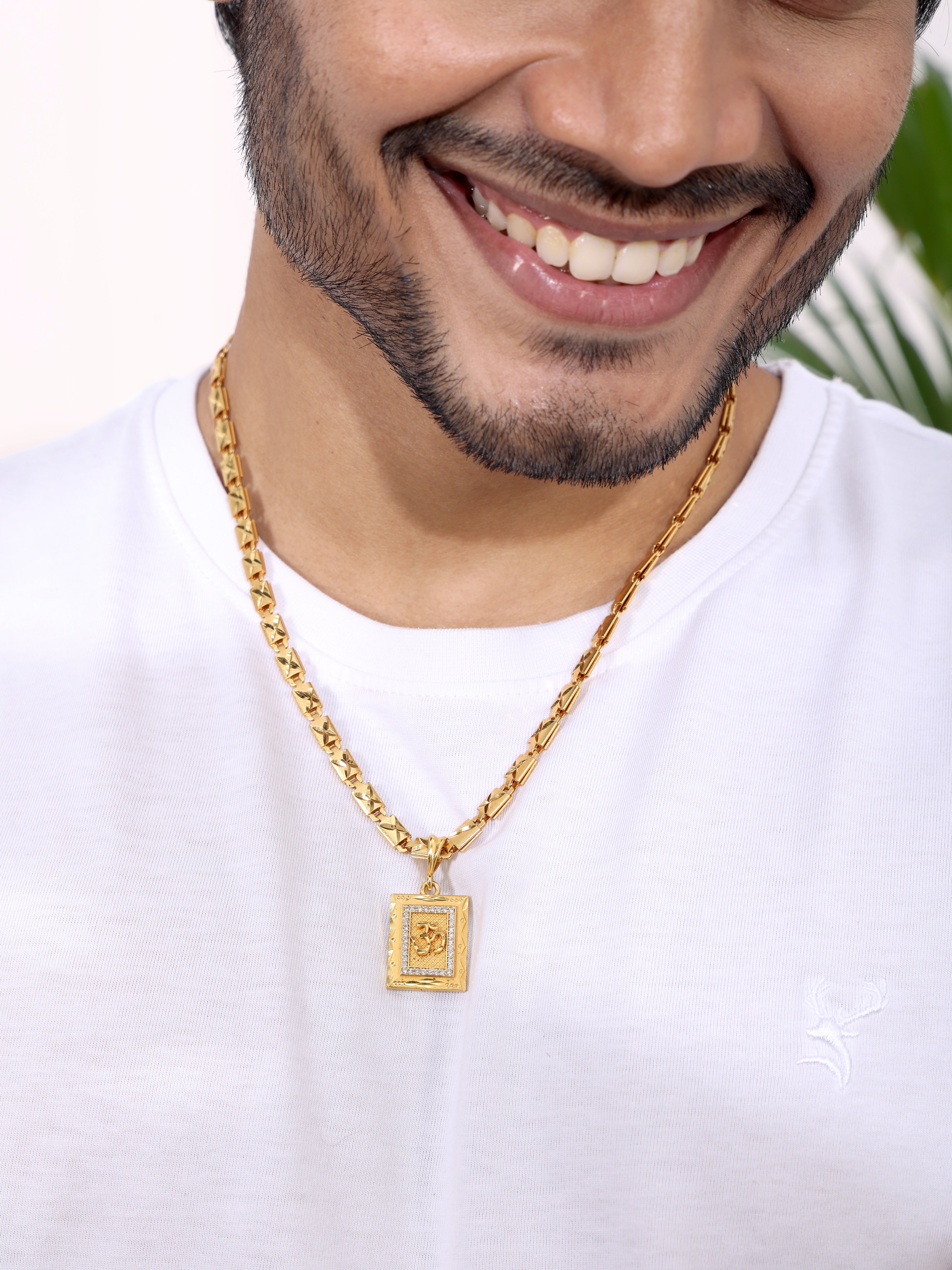 Om Pendant With a Statement Gold Chain